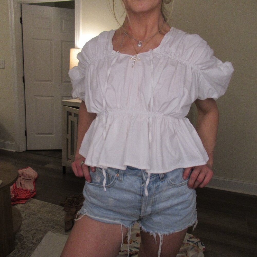 White ruffled babydoll top